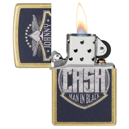 Zippo Johnny Cash Crest Design Street Brass Windproof Lighter with its lid open and lit.