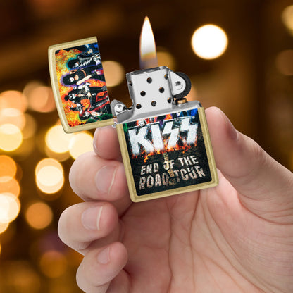 Zippo KISS® End of the Road Design Street Brass Windproof Lighter lit in hand.