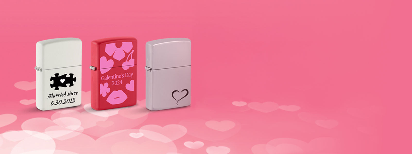 Three lighters with personalized designs on a pink background with heart shapes.