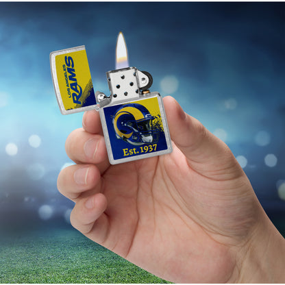 Zippo NFL Los Angeles Rams Helmet Design Street Chrome Windproof Lighter lit in hand.