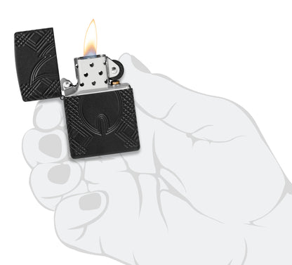 Zippo Rivet Flame Armor® Black Matte Windproof Lighter lit in hand.