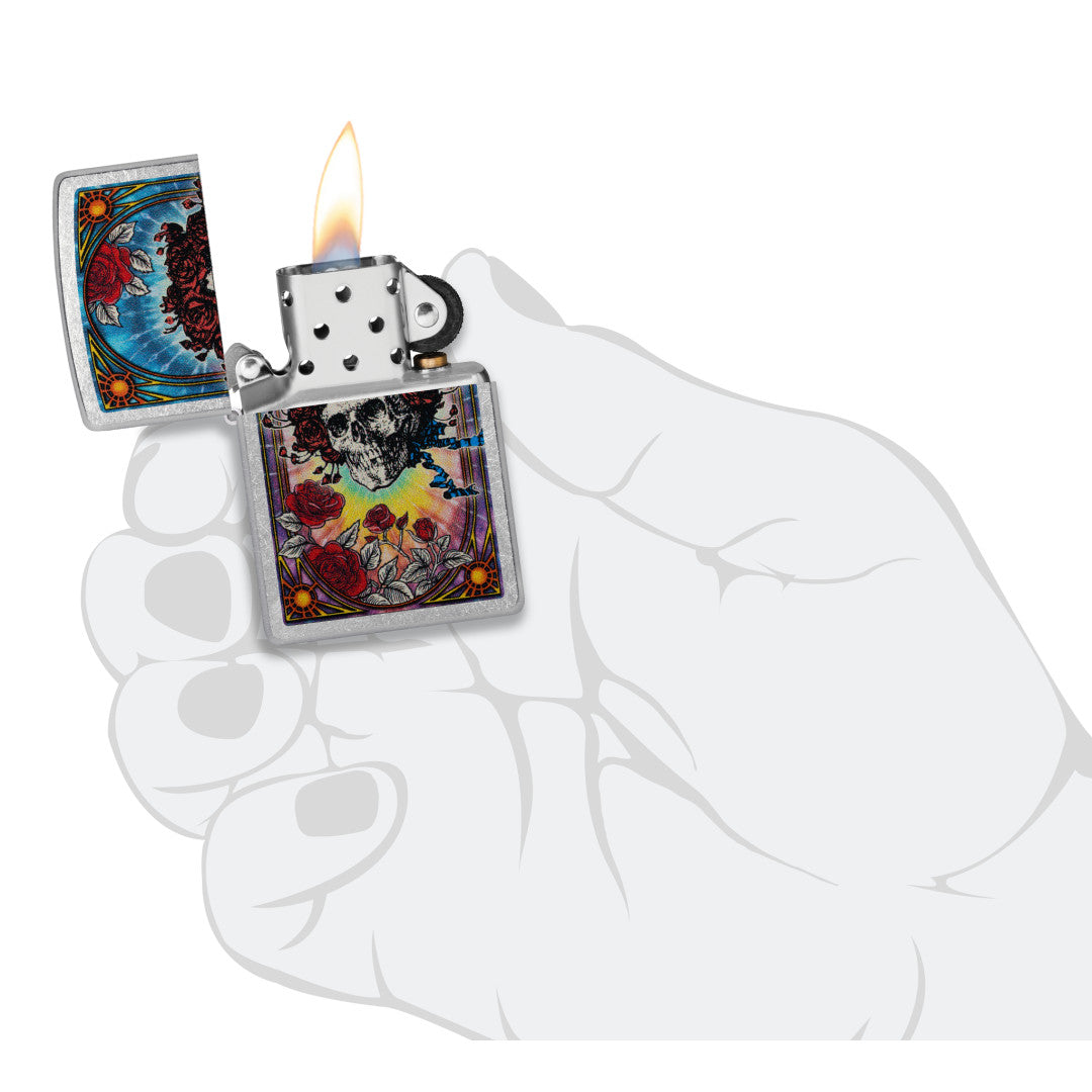 Zippo Grateful Dead Bertha Design Street Chrome Windproof Lighter lit in hand.