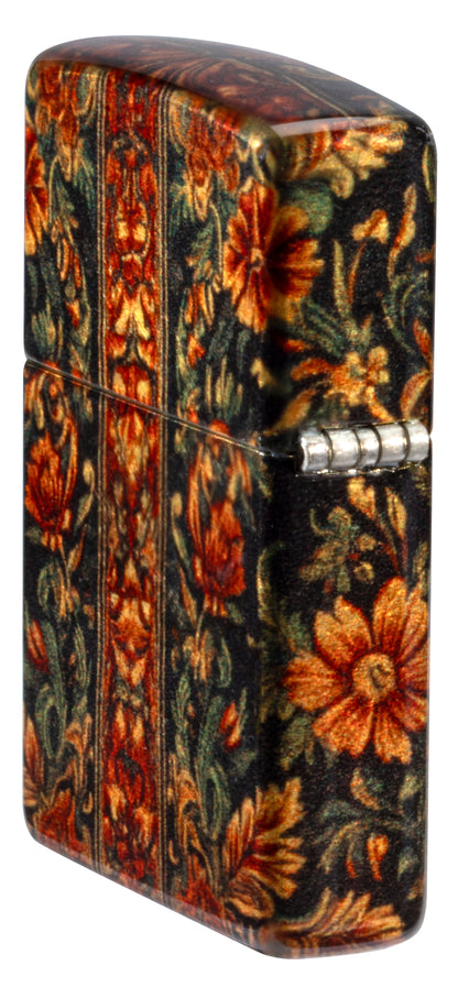 Angled shot of  Zippo Cannabis Tapestry Design Tumbled Brass Windproof Lighter showing the back and hinge side of the lighter.