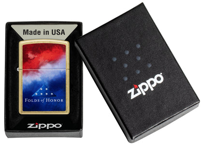 Zippo Folds of Honor Clouds Design Street Brass Windproof Lighter in its packaging.
