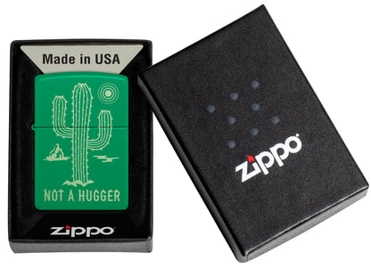 Zippo Not a Hugger Design Grass Green Matte Windproof Lighter in its packaging.