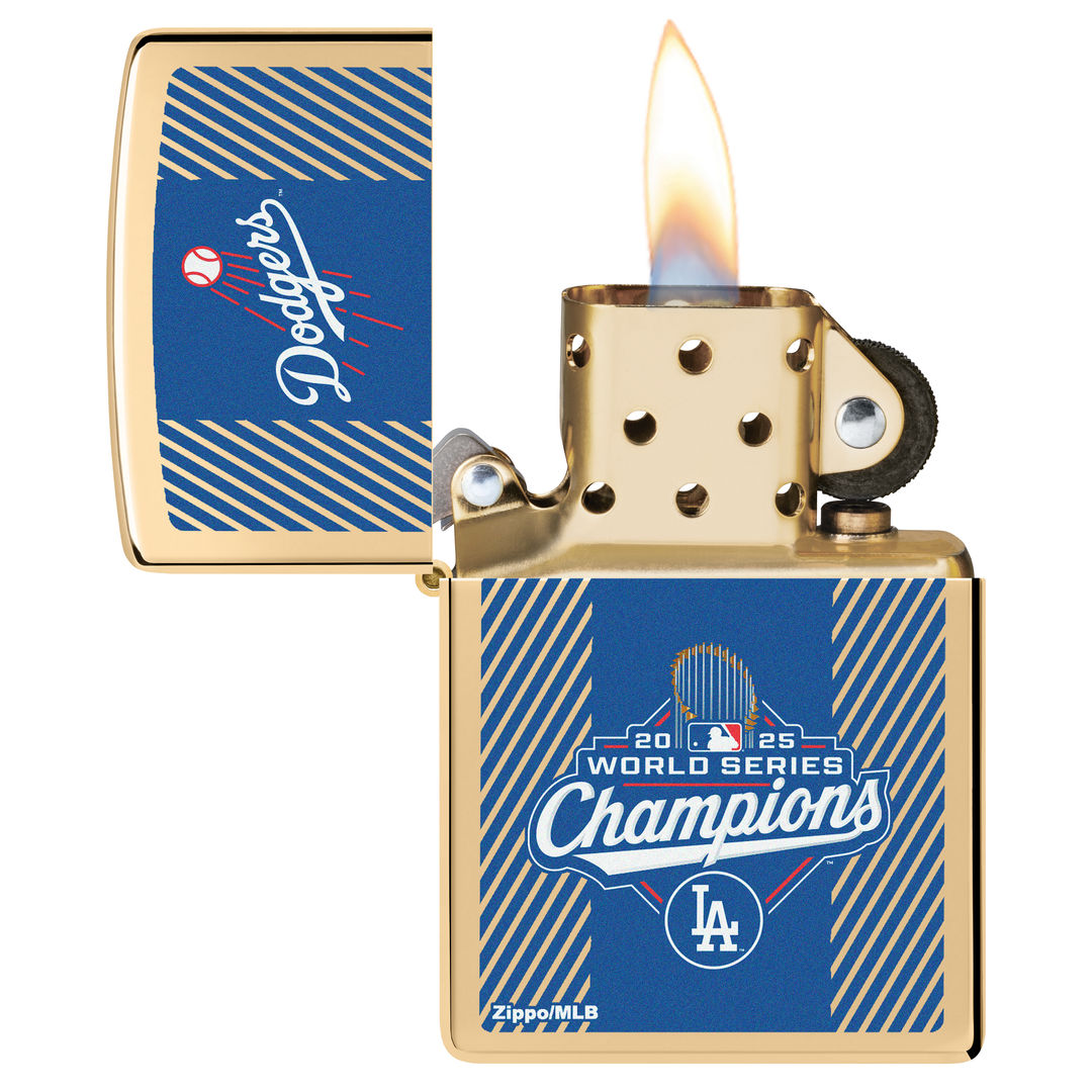 Zippo 2025 World Series™ Champions Commemorative High Polish Brass Windproof Lighter with its lid open and lit.