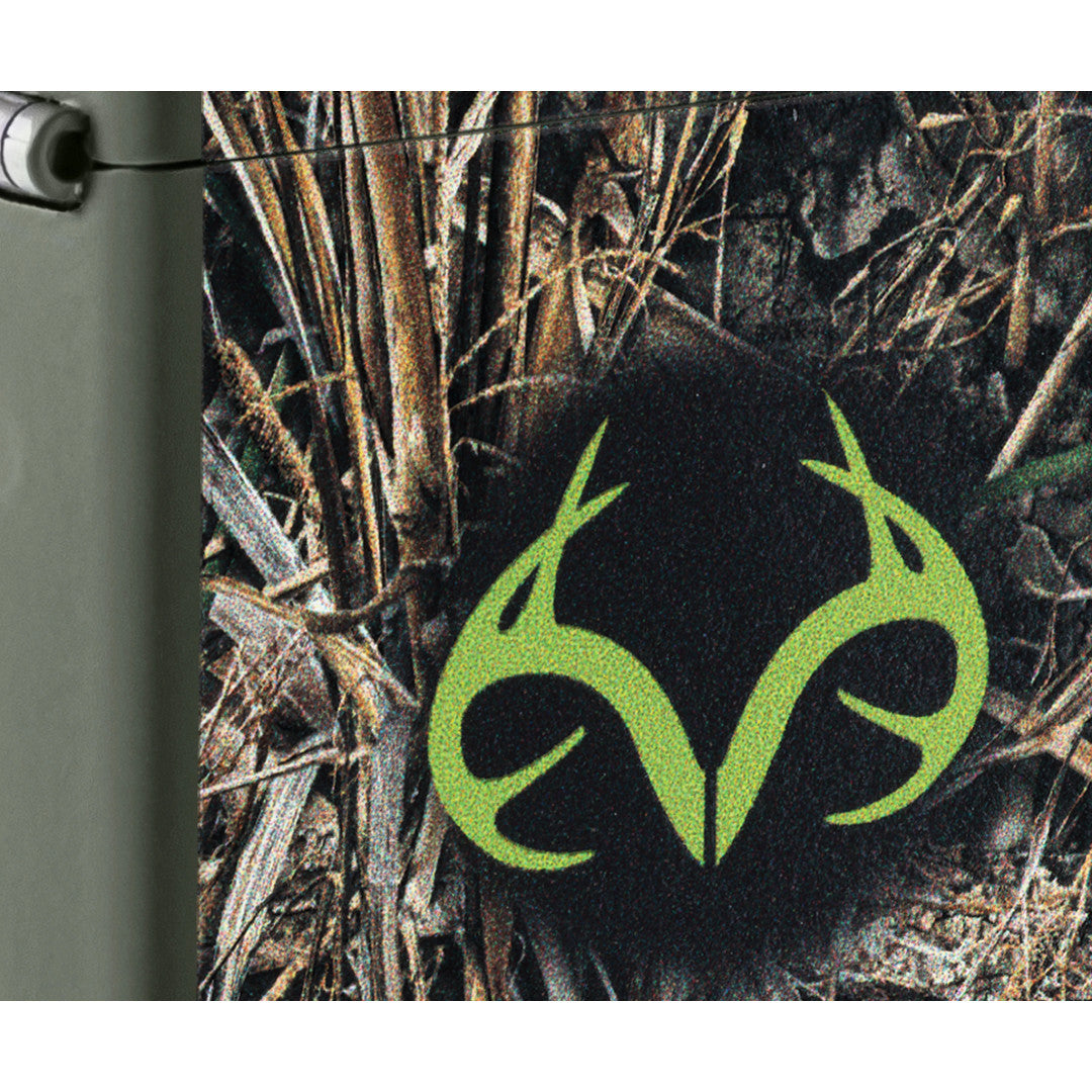 Front view of Zippo Realtree® Brush Design Green Matte Windproof Lighter close up to show the detail of the lighter.