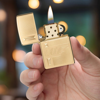 Zippo James Bond 007™ Gingham Design High Polish Brass Windproof Lighter lit in hand.