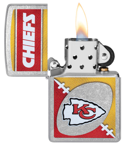 Zippo NFL Kansas City Chiefs Street Chrome Windproof Lighter with its lid open and lit.