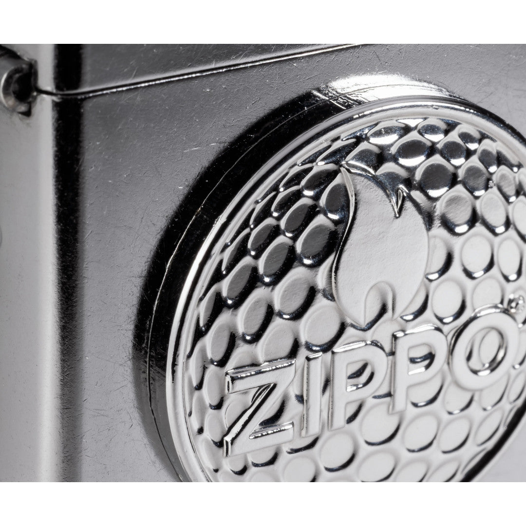 Front view of Zippo Golf Ball Marker Emblem – Zippo Design Street Chrome Windproof Lighter close up to show the detail of the lighter.