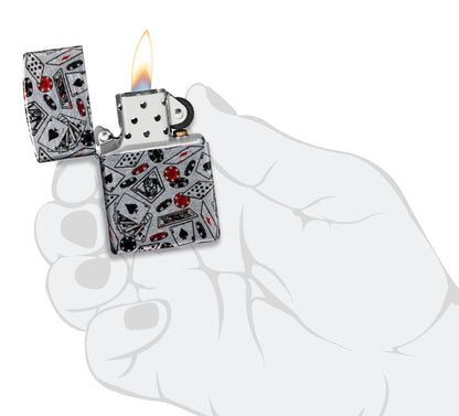 Zippo Let the Chips Fall Design 540 Tumbled Chrome Windproof Lighter lit in hand.