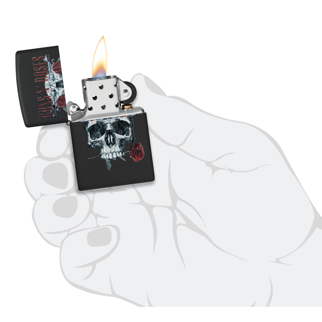 Zippo Guns N' Roses Flower Skull Design Black Matte Windproof Lighter lit in hand.