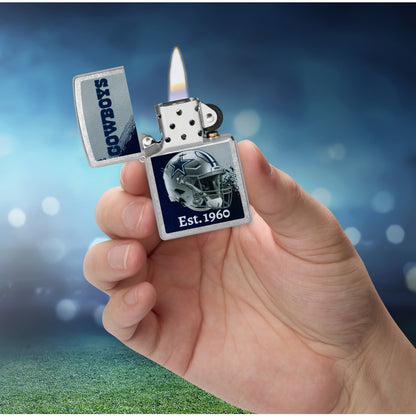 Zippo NFL Dallas Cowboys Helmet Design Street Chrome Windproof Lighter lit in hand.