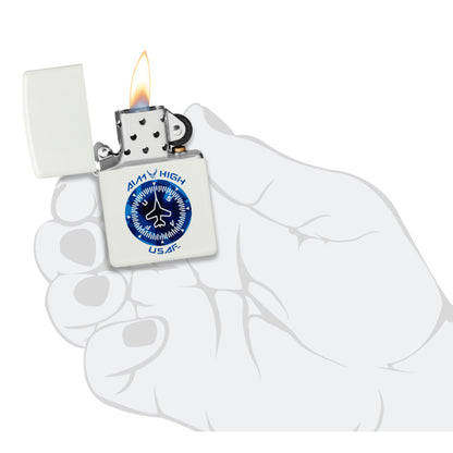 Zippo U.S. Air Force™ Aim High Design White Matte Windproof Lighter lit in hand.