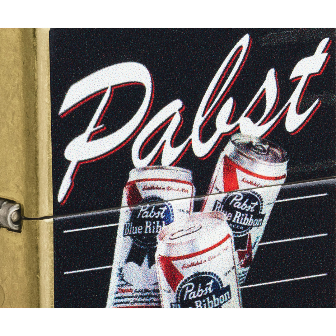 Front view of Zippo Pabst Blue Ribbon® American Classic Design Street Brass Windproof Lighter close up to show the detail of the lighter.
