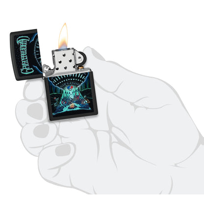 Zippo Grateful Dead Black Light UFO Design Black Matte Windproof Lighter lit in hand.