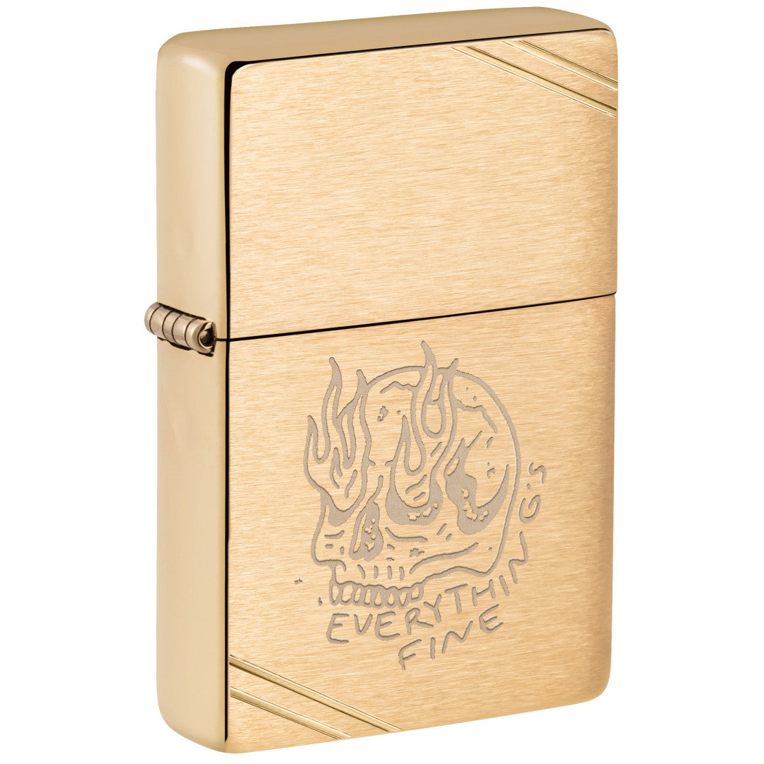 Front shot of Zippo Everything's Fine Design Vintage Brushed Brass Windproof Lighter standing at a 3/4 angle.