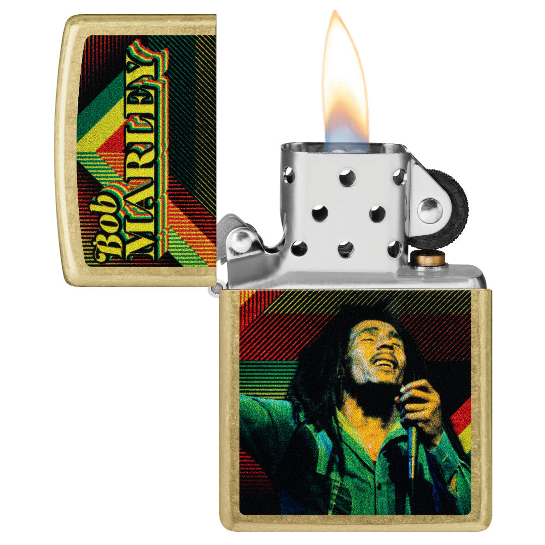 Zippo Bob Marley Soul Design Street Brass Windproof Lighter with its lid open and lit.