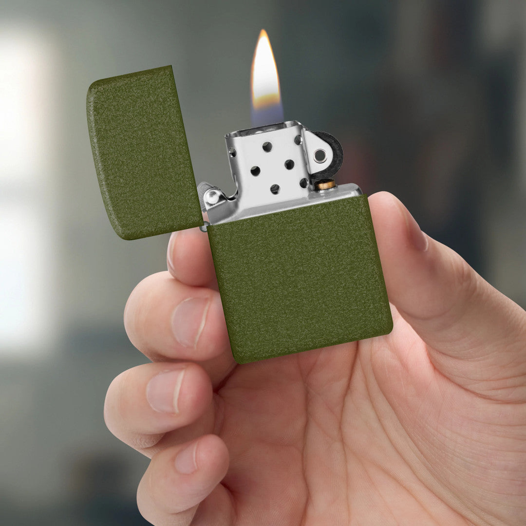 Zippo 2026 Founder’s Day Commemorative Green Crackle Windproof Lighter lit in hand.