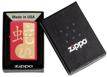 Zippo Year of the Snake 2025 Red Matte Windproof Lighter in its packaging.