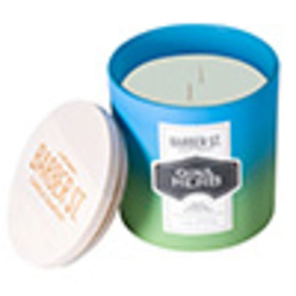 Front shot of Zippo Barber Street Gin Herb  Odor Masking Candle, with its lid off