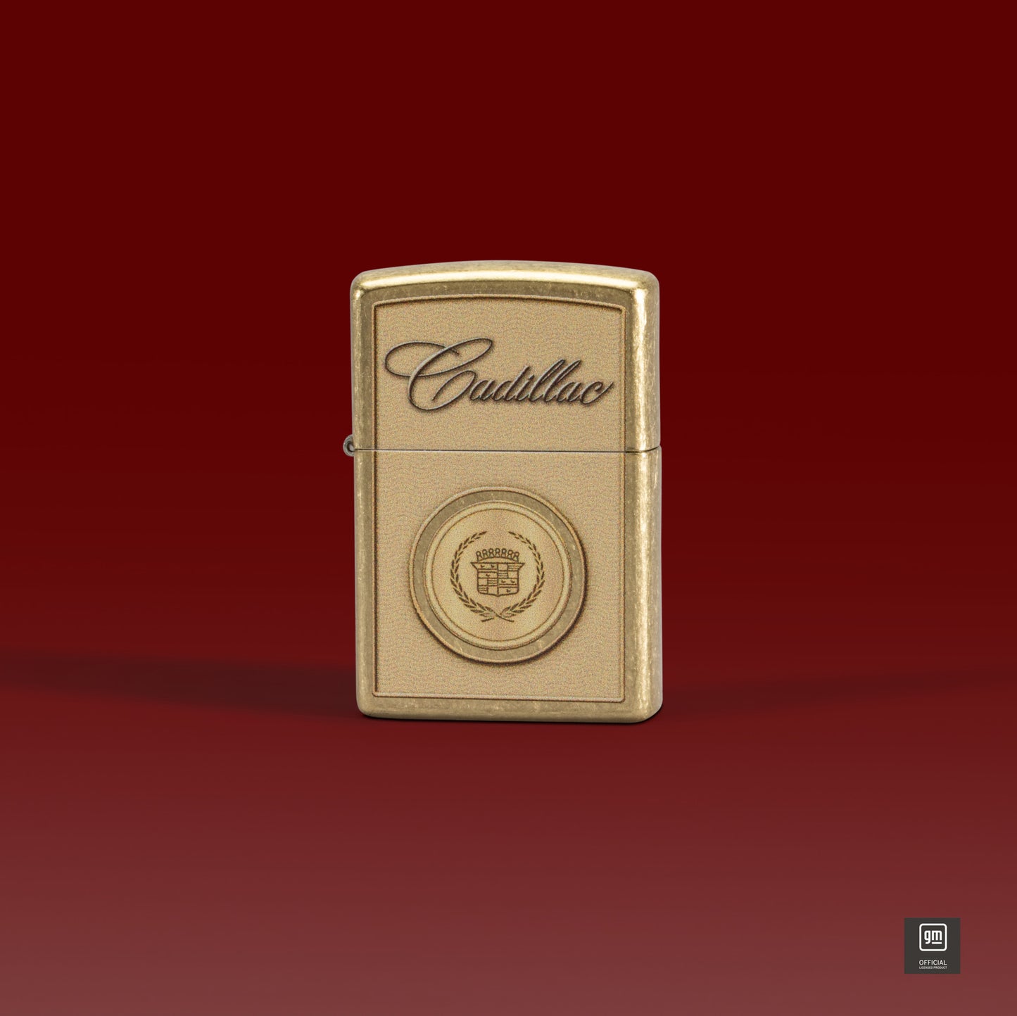 Lifestyle image of Zippo Cadillac Crest Design Street Brass Windproof Lighter standing with a maroon background. 


