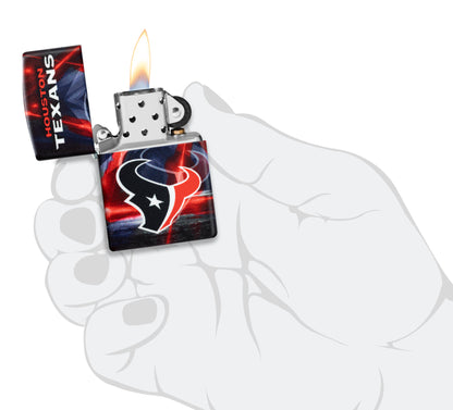 Zippo NFL Houston Texans 540 Matte Windproof Lighter lit in hand.