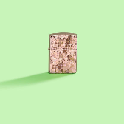 Lifestyle image of Zippo Hearts Armor High Polish Rose Gold Windproof Lighter on a pastel green background.