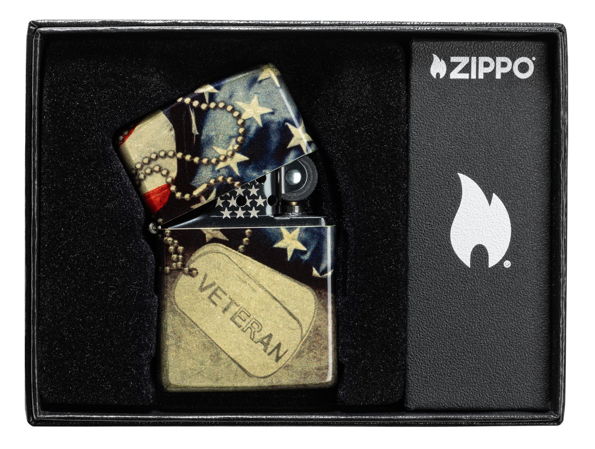 Zippo Veterans Commemorative 540 Tumbled Brass Windproof Lighter in its packaging.