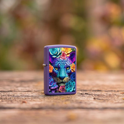 Lifestyle image of Zippo Groovy Leopard Design Purple Matte Windproof Lighter standing on a wooden surface showing the front and hinge side of the lighter with an out of focus outdoor background. 

