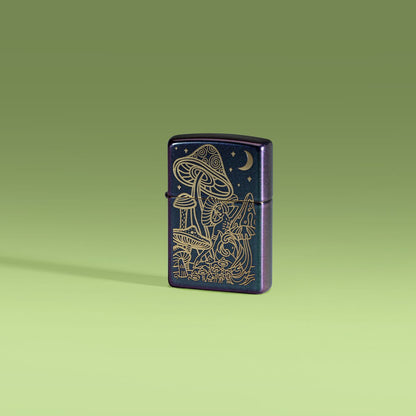 Lifestyle image of Zippo Laser Mushrooms Design Iridescent Windproof Lighter standing on a green ombre scene.