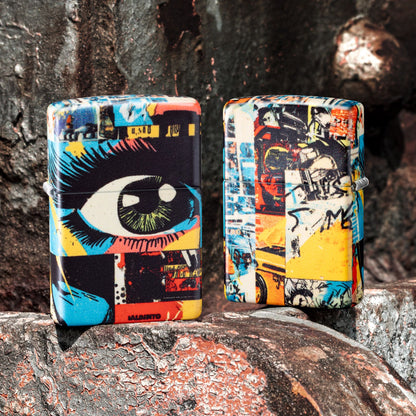 Lifestyle images of two Zippo Eye See You Design 540 Matte Windproof Lighters standing on a weathered painted steel surface; one showing the front of the lighter, while the other is showing the back and hinge side of the lighter. 