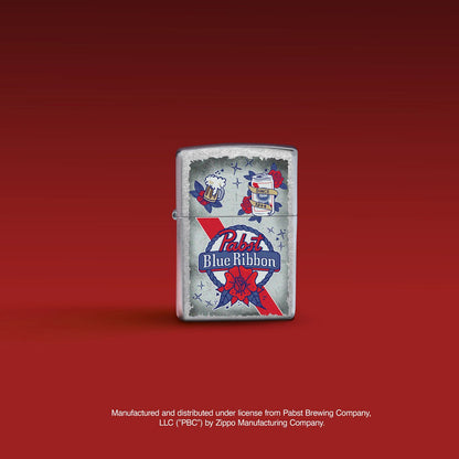 Lifestyle image of Pabst Blue Ribbon® Artwork Design Street Chrome Windproof Lighter standing with a red background. 

