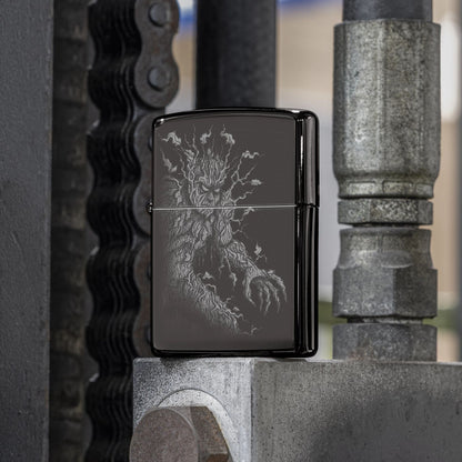 Lifestyle image of Zippo Root of All Evil Design High Polish Black Windproof Lighter standing on a metal surface in a workshop while showing the front of the lighter. 

