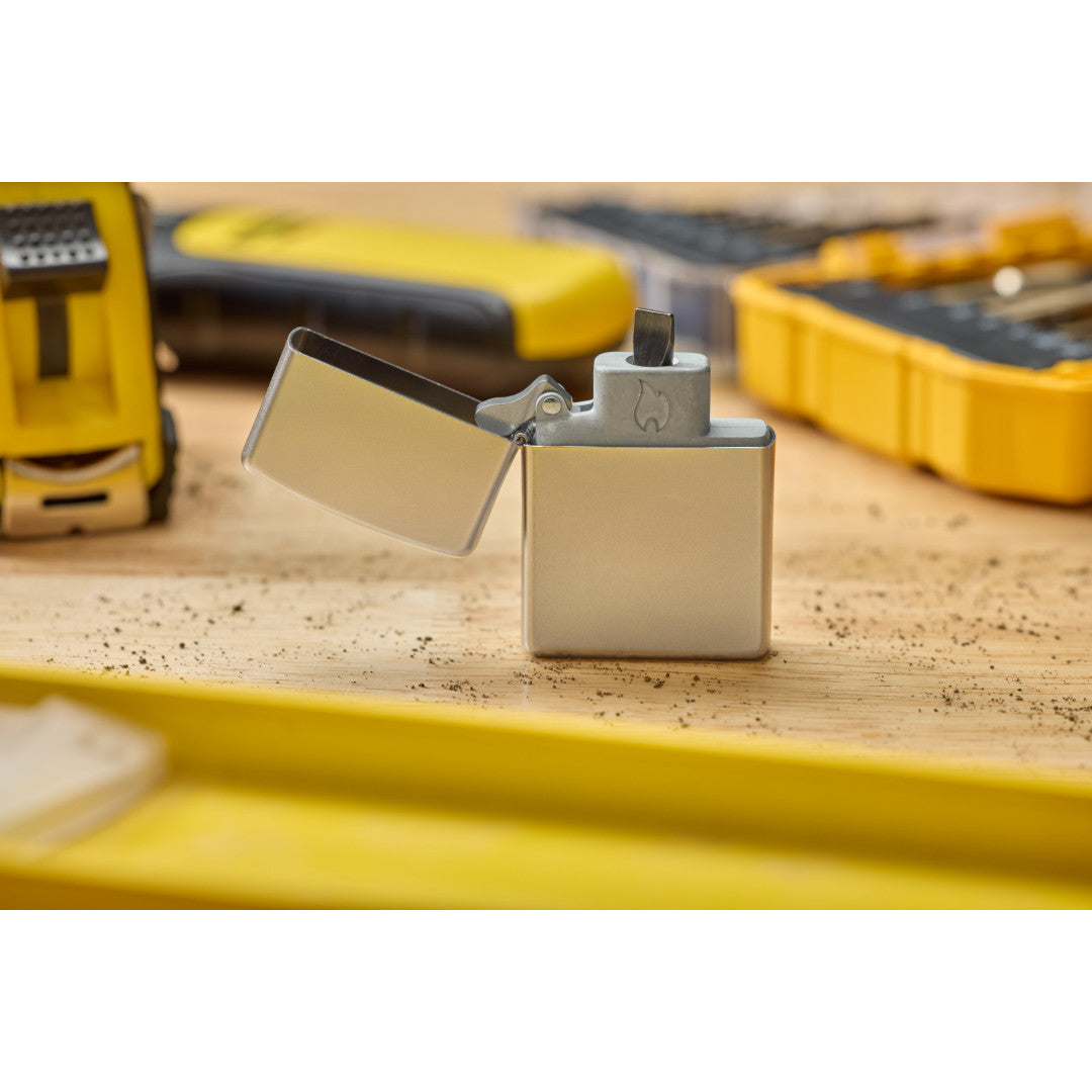 Lifestyle Image of Bit Safe sitting on worktable inside the Satin Chrome Case. 