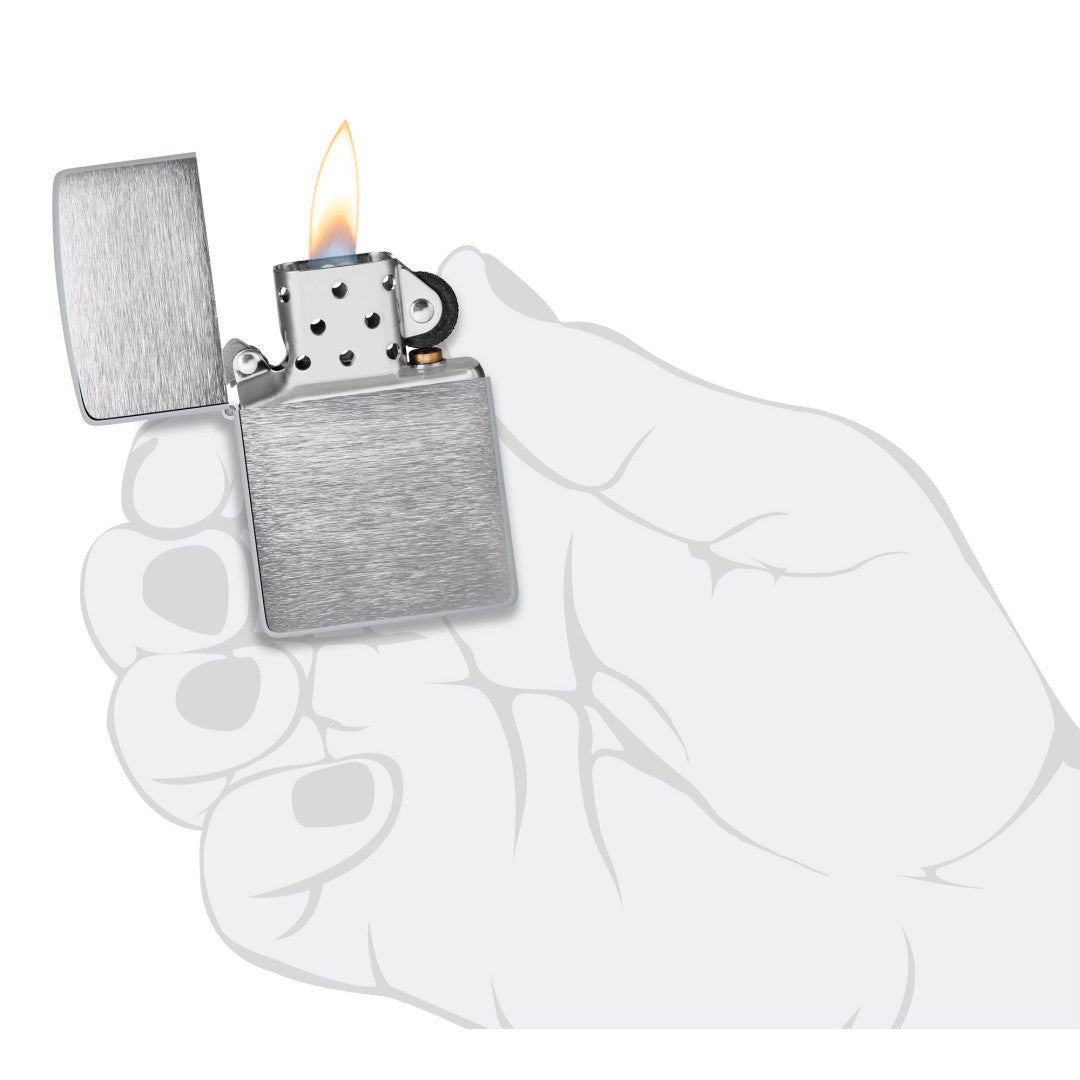 Armor® Brushed Chrome Windproof Lighter lit in hand.
