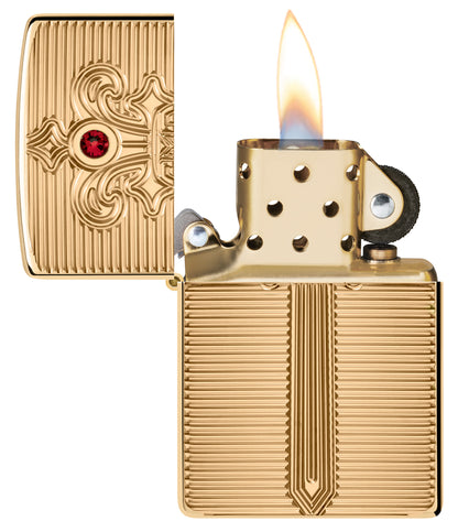 Zippo Royal Saber Design Armor® High Polish Brass Windproof Lighter with its lid open and lit.