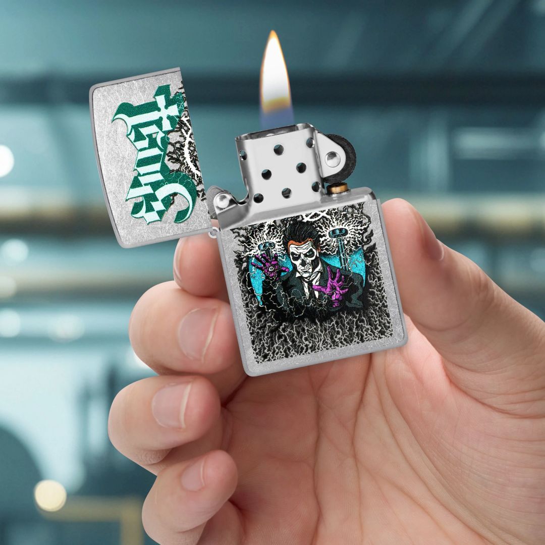 Zippo Ghost Papa III Design Classic Street Chrome Windproof Lighter lit in hand.
