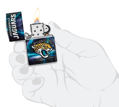 Zippo NFL Jacksonville Jaguars 540 Matte Windproof Lighter lit in hand.