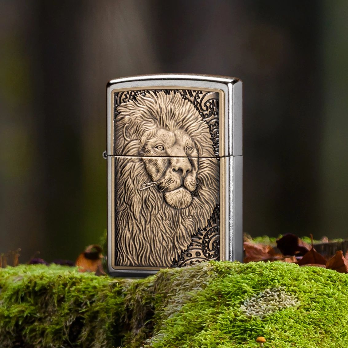 Lifestyle image of Zippo Lion Emblem Street Chrome Windproof Lighter standing at a 3/4 angle on an old mossy tree stump, showing the front and non-hinge side of the lighter.