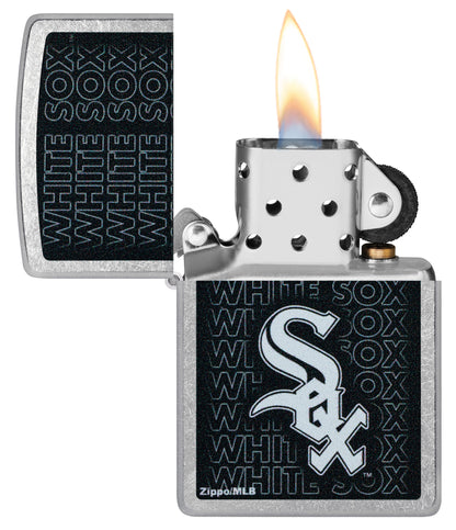 Zippo MLB® Chicago White Sox Street Chrome Windproof Lighter with its lid open and lit.