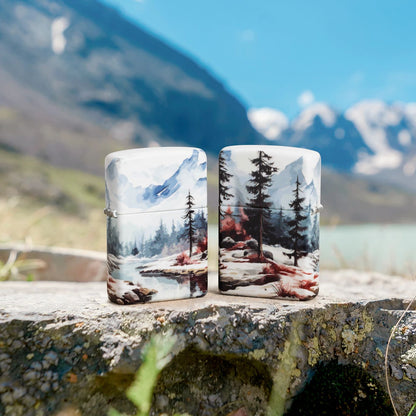 Lifestyle image of two Zippo Frozen Valley Design 540 Matte Windproof Lighters standing on a rock with mountains in the background.