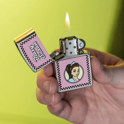 Lifestyle image of Zippo Blazy Susan™ Checker Design Street Chrome Windproof Lighter lit in hand showing the front of the lighter with a lime green background. 