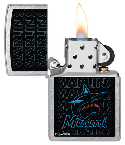 Zippo MLB® Miami Marlins Street Chrome Windproof Lighter with its lid open and lit.