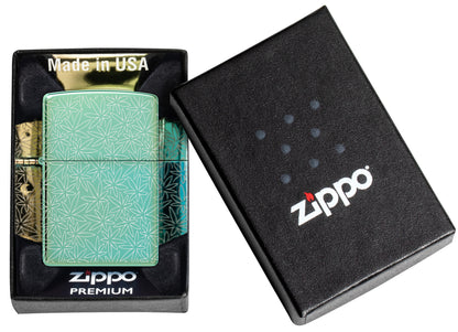 Zippo Atomic Cannabis Design High Polish Green Windproof Lighter in its packaging.