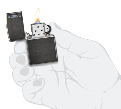 Zippo Classic Grey Zippo Logo Windproof Lighter lit in hand.