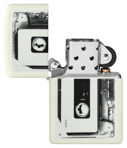 Zippo Cassette Tape Design Glow in the Dark Windproof Lighter with its lid open and unlit.