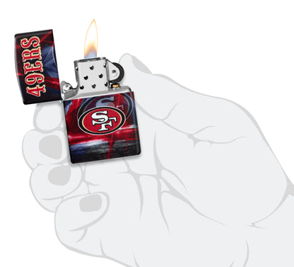 Zippo NFL San Francisco 49ers 540 Matte Windproof Lighter lit in hand.