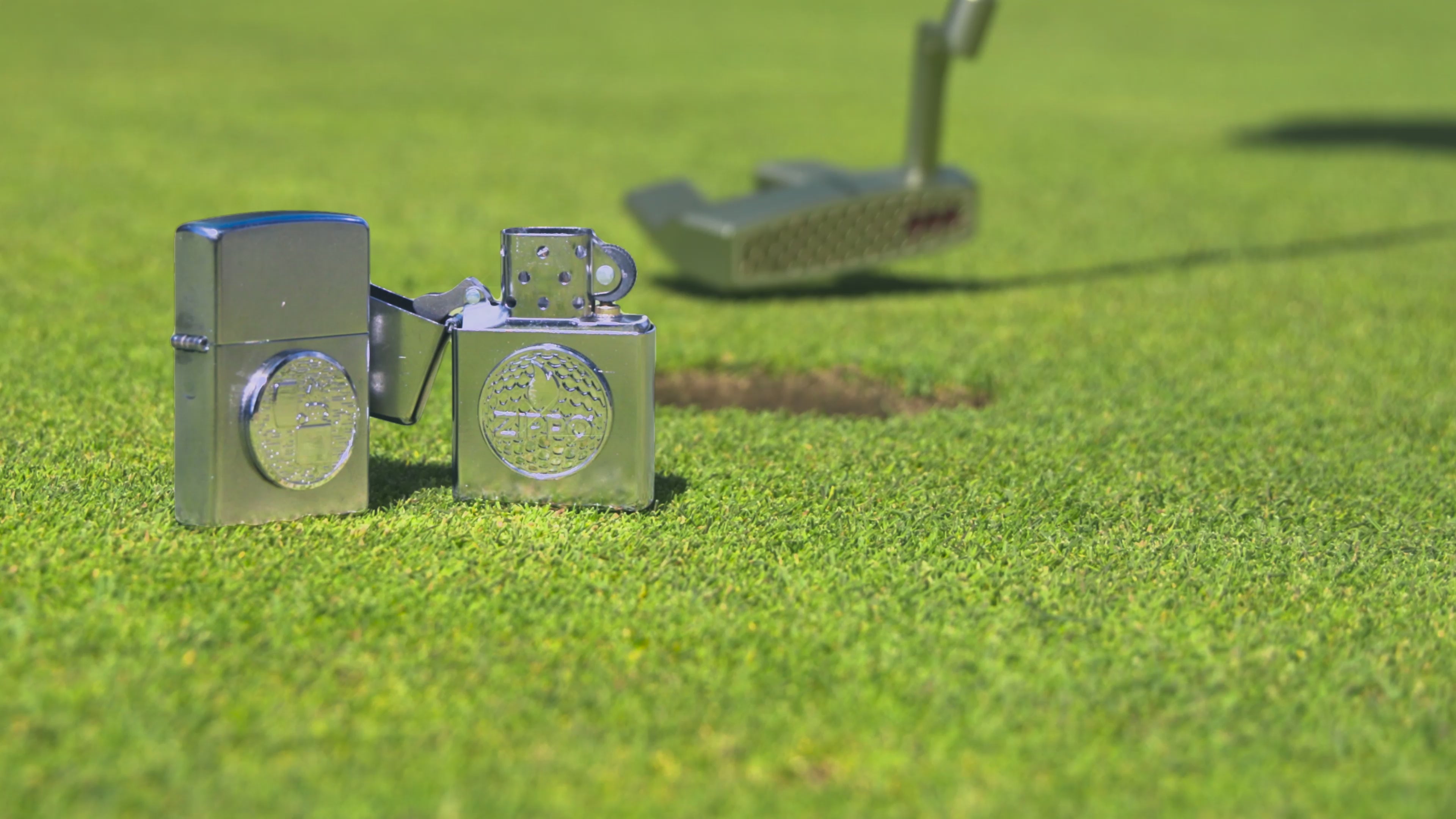 Load video: Video illustrating the magnetic golf ball marker attached to the lighter case.