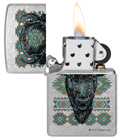 Zippo Buck Wear™ Southwest Bison Design Street Chrome Windproof Lighter with its lid open and lit.